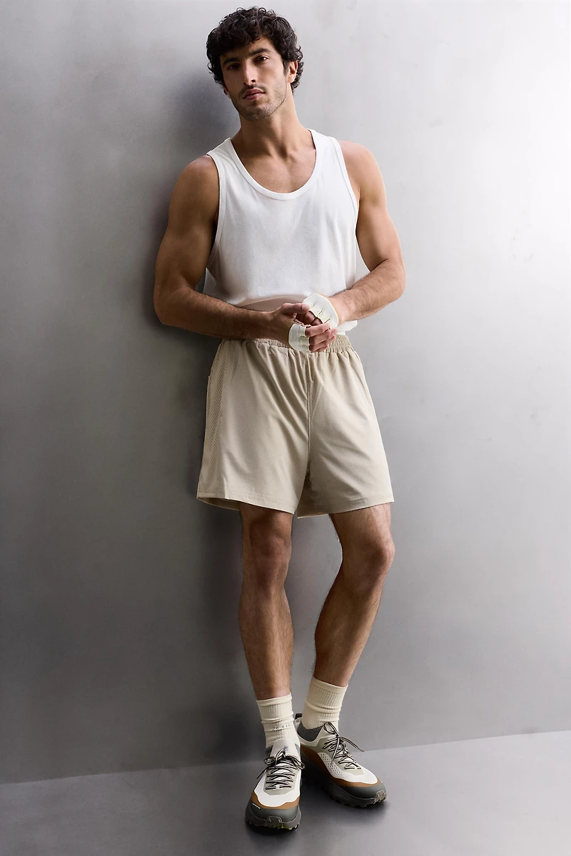 COMBINED PERFORATED SHORTS