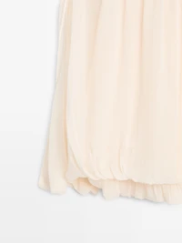 Voluminous flowing blouse