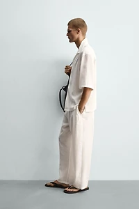 PANTALON FLUIDE À PLIS LATÉRAUX