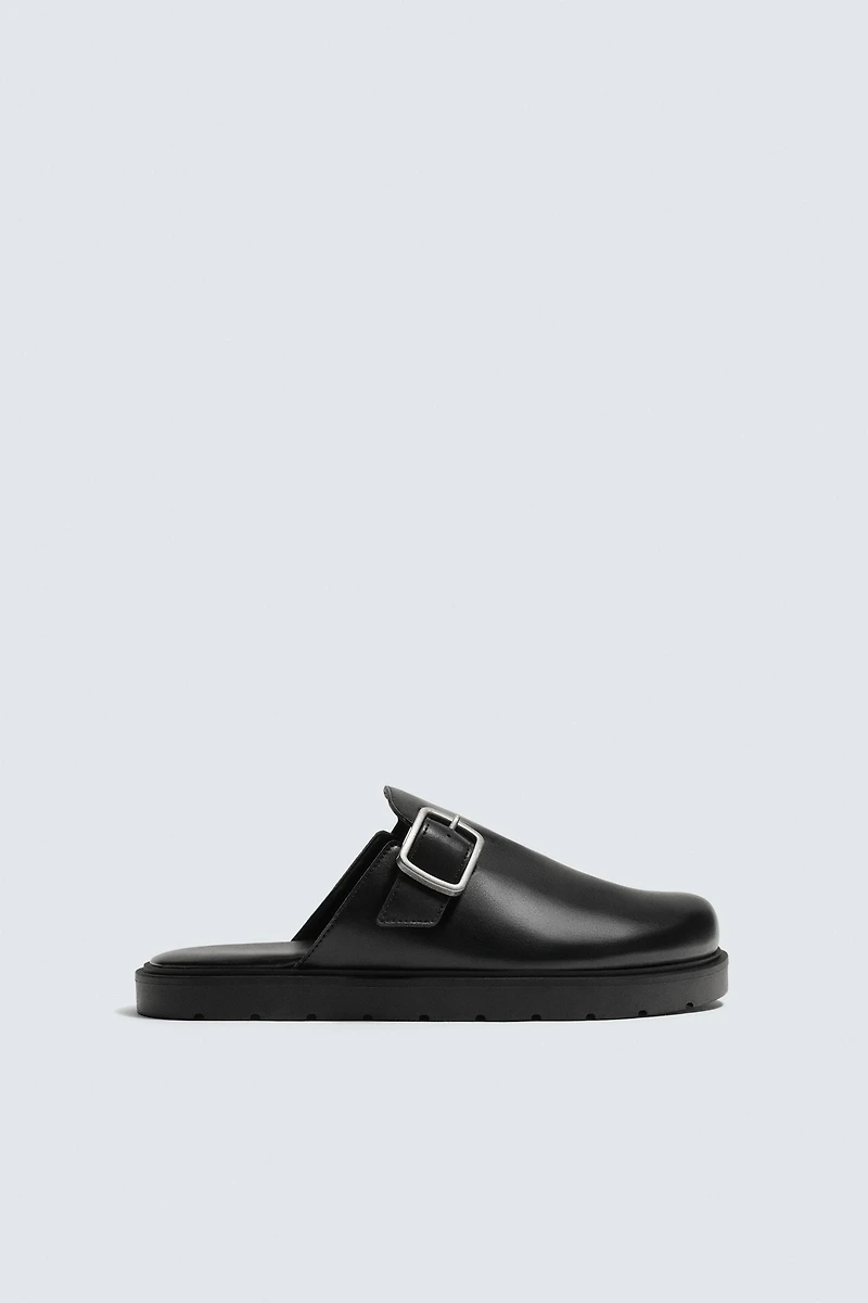 BUCKLE CLOGS