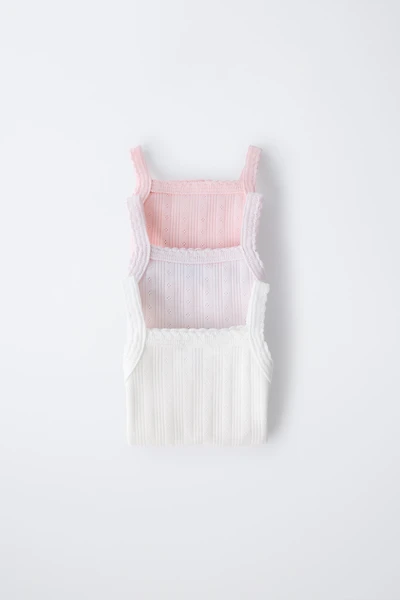 THREE-PACK OF RIB KNIT BODYSUITS WITH CUTOUT DETAIL