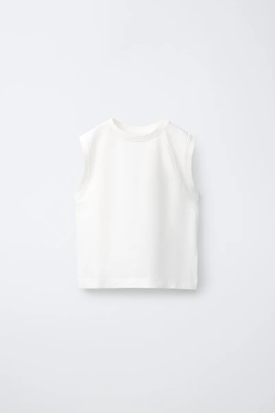 T-SHIRT UNI SANS MANCHES