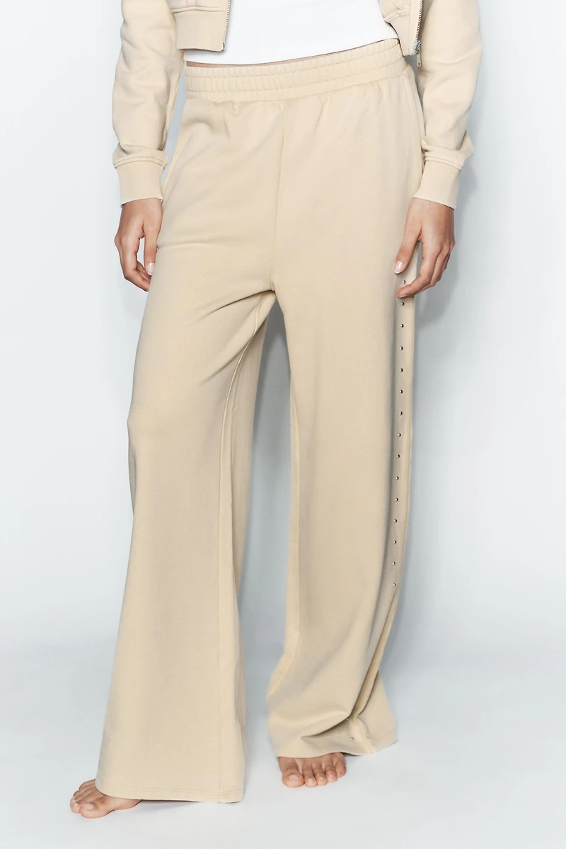 WASHED EFFECT FLEECE PANTS WITH STUDS