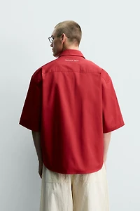 CHEMISE RELAXED FIT BRODERIES CONTRASTANTES