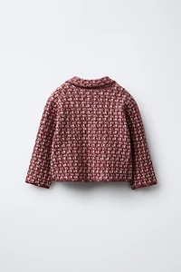 GILET EN MAILLE À NŒUD