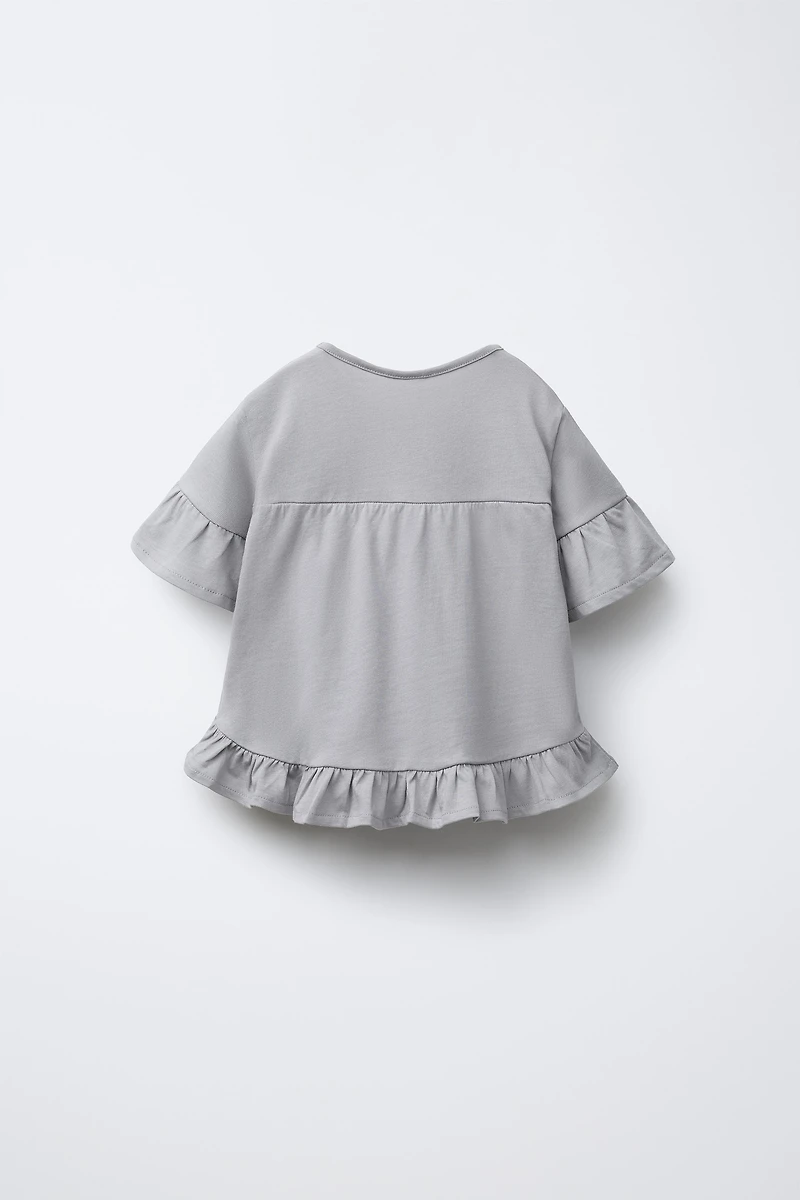 T-SHIRT UNI À VOLANTS