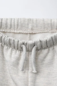 PANTALON MOLLETON À POCHES IMPRIMÉ