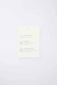 DOUDOUNE EN PLUME ET DUVET DÉPERLANTE AVEC ÉTIQUETTE