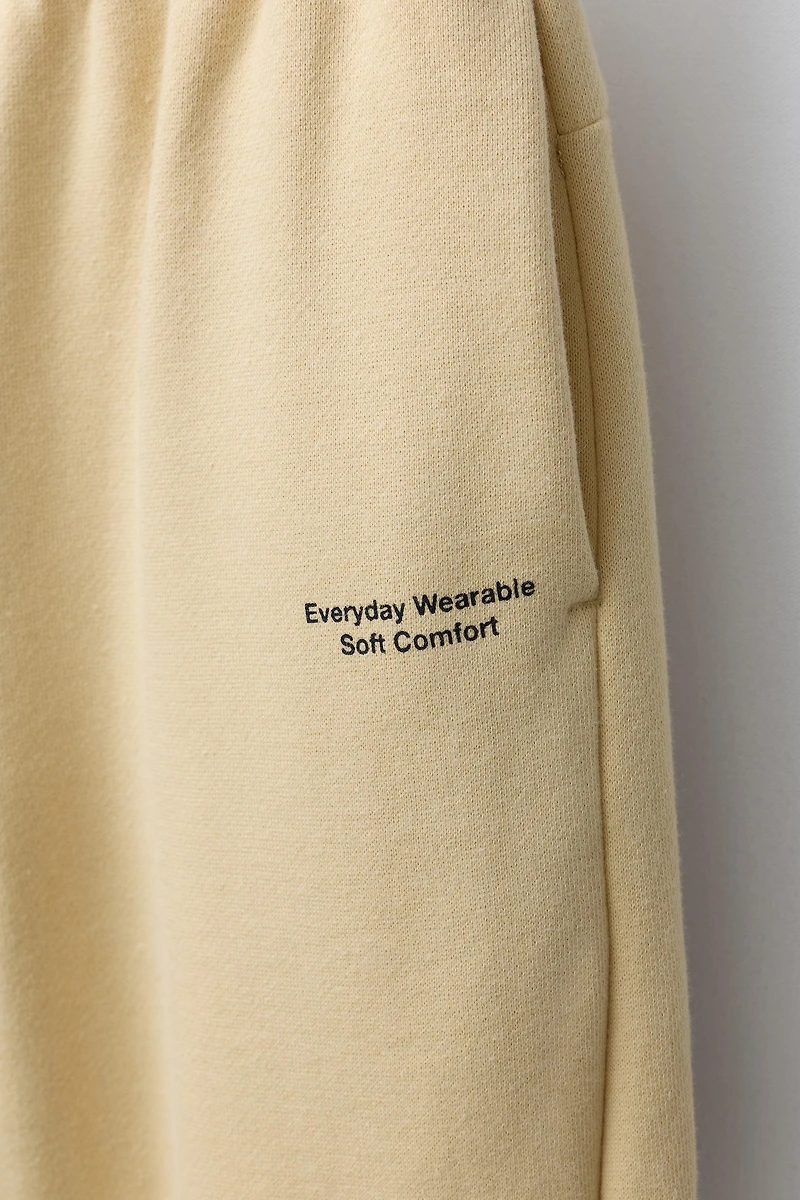 JOGGING PANTS WITH TEXT PRINT