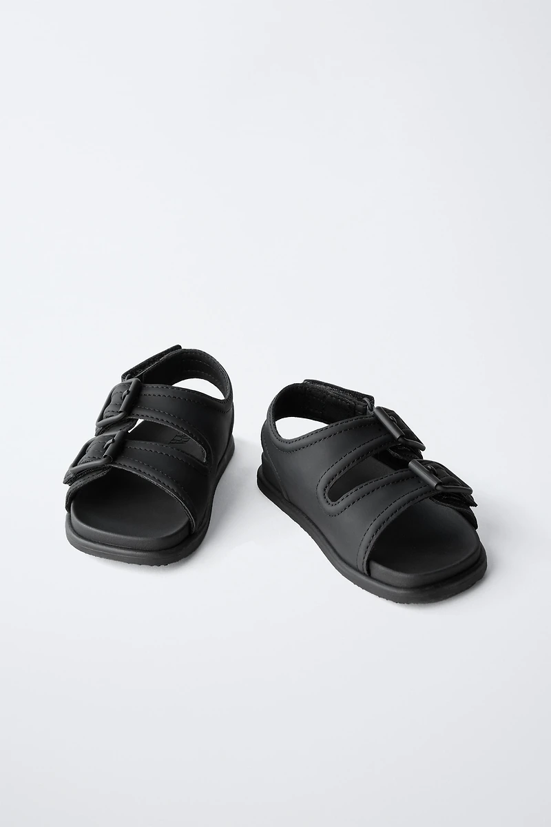 BUCKLED SANDALS