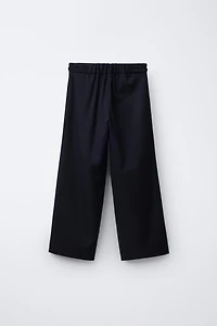 PANTALON À JAMBES LARGES AVEC DÉTAIL TRESSÉ