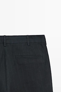 Linen trousers with striped detail