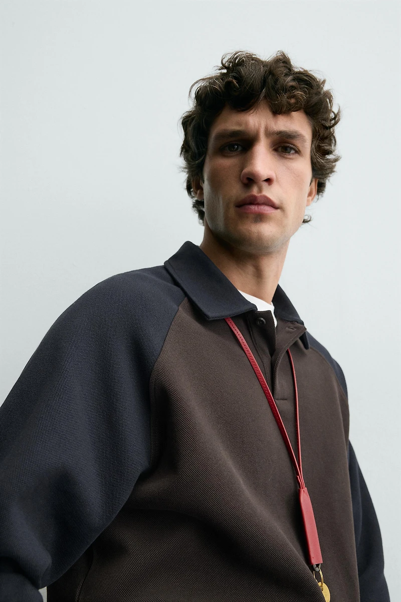 POLO COLOR BLOCK MANCHES RAGLAN