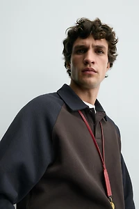 POLO COLOR BLOCK MANCHES RAGLAN