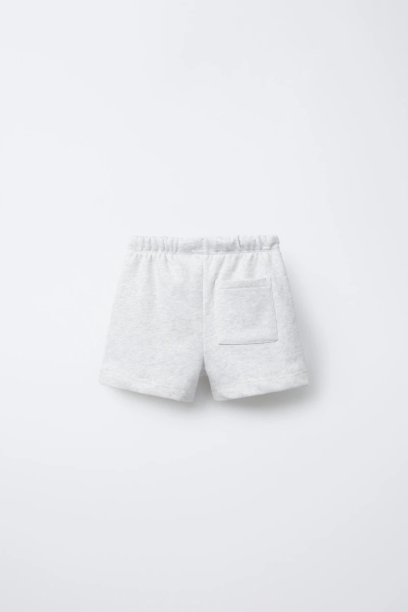 TEXT PLUSH SHORTS