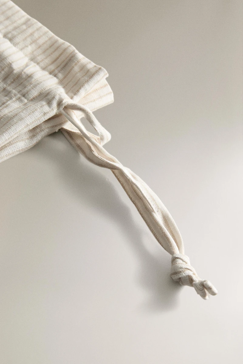 STRIPED BAG WITH DRAWSTRING CLOSURE