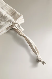 STRIPED BAG WITH DRAWSTRING CLOSURE