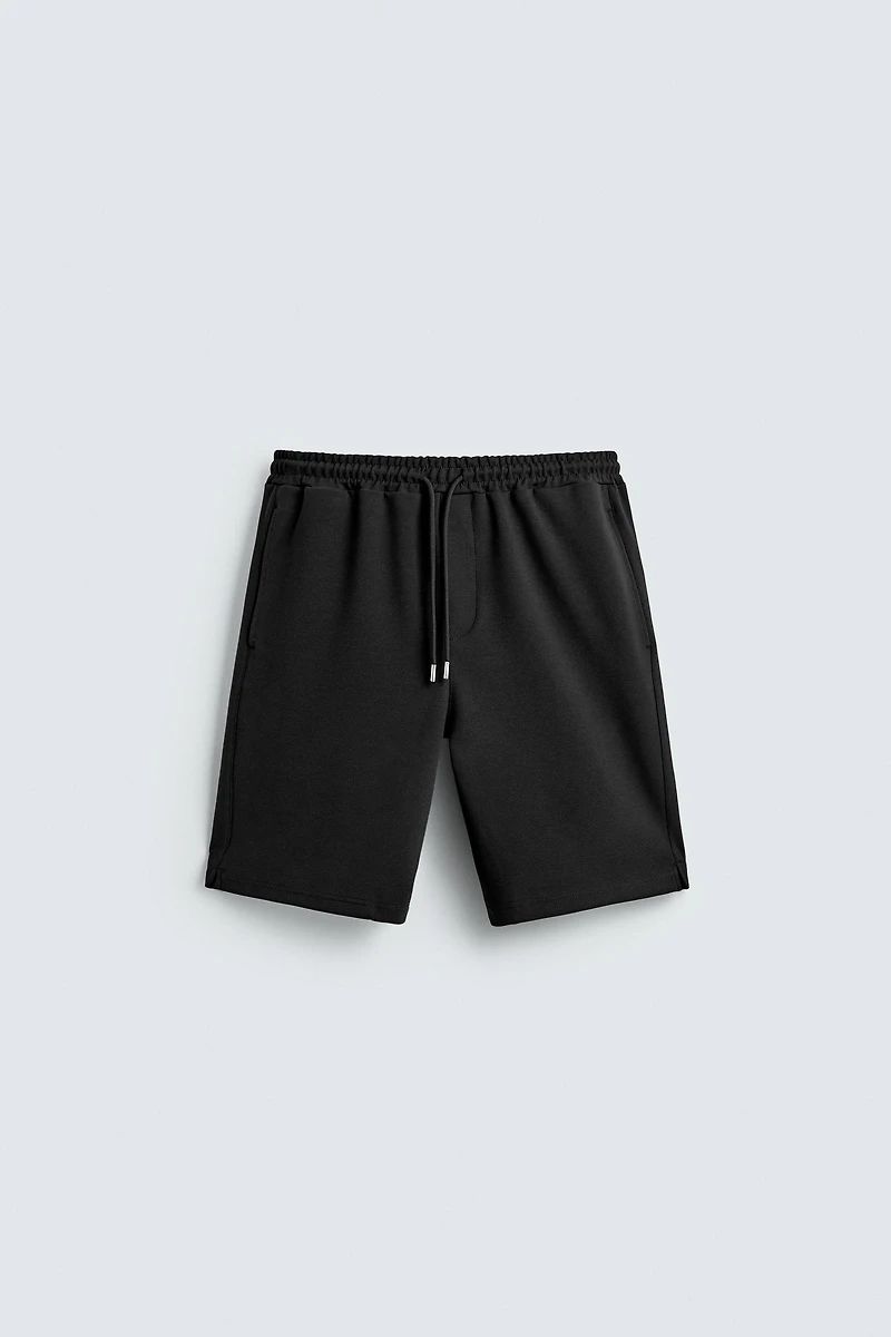 BERMUDA INTERLOCK ÉTIQUETTE