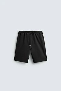 BERMUDA INTERLOCK ÉTIQUETTE