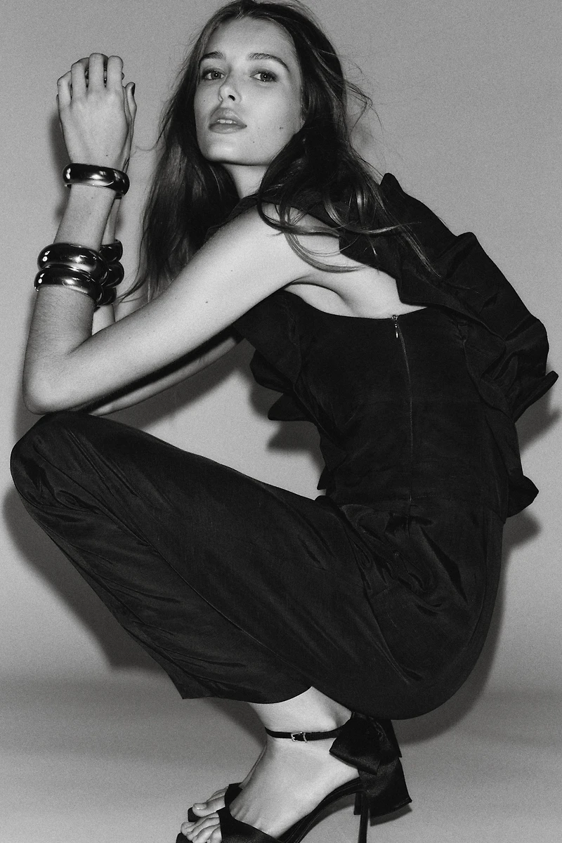 ASYMMETRIC RUFFLE JUMPSUIT