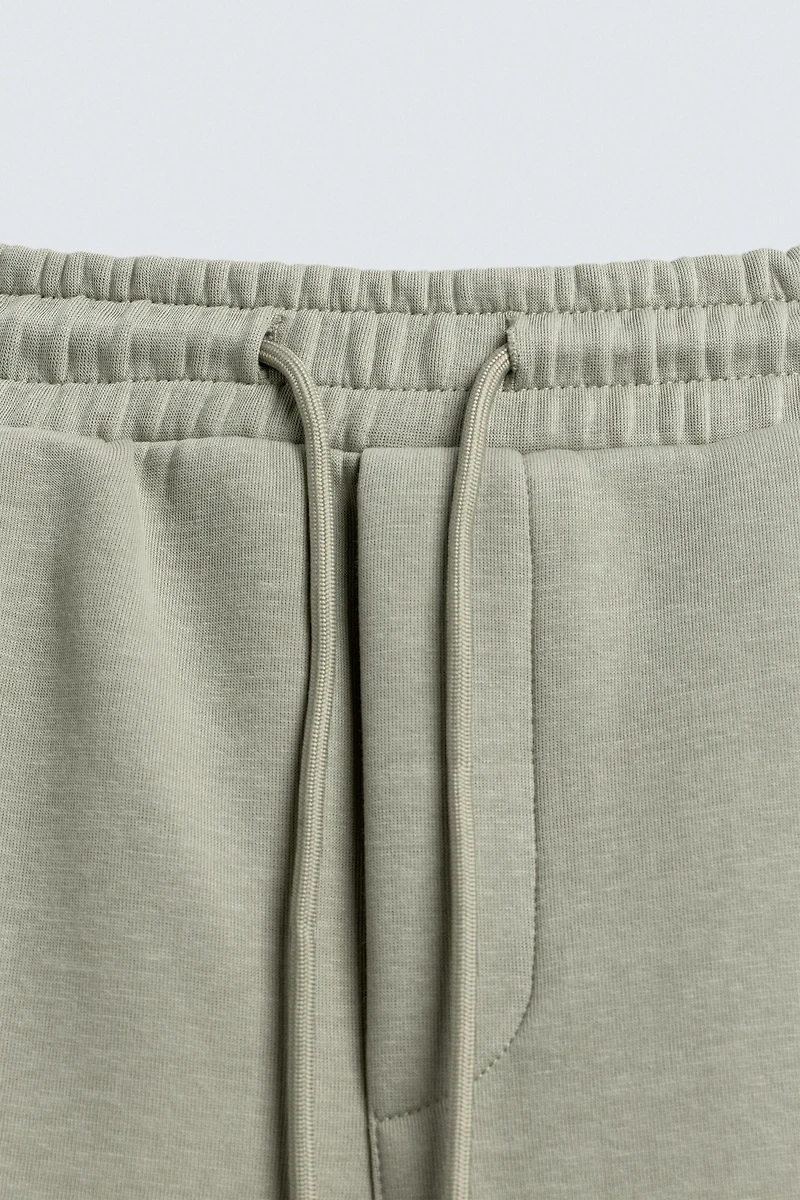 RELAXED FIT INTERLOCK JOGGING PANTS