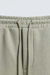 RELAXED FIT INTERLOCK JOGGING PANTS