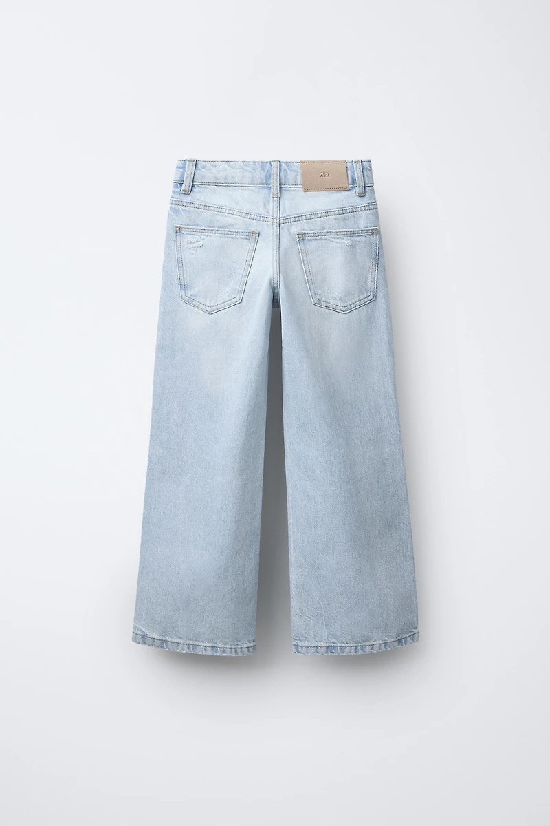 JEANS WIDE LEG À DÉCHIRURES