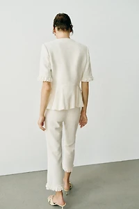 VESTE PEPLUM À VOLANTS ET MANCHES COURTES