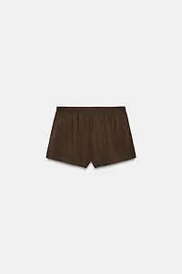 FLOWY SHORTS WITH BUTTONS