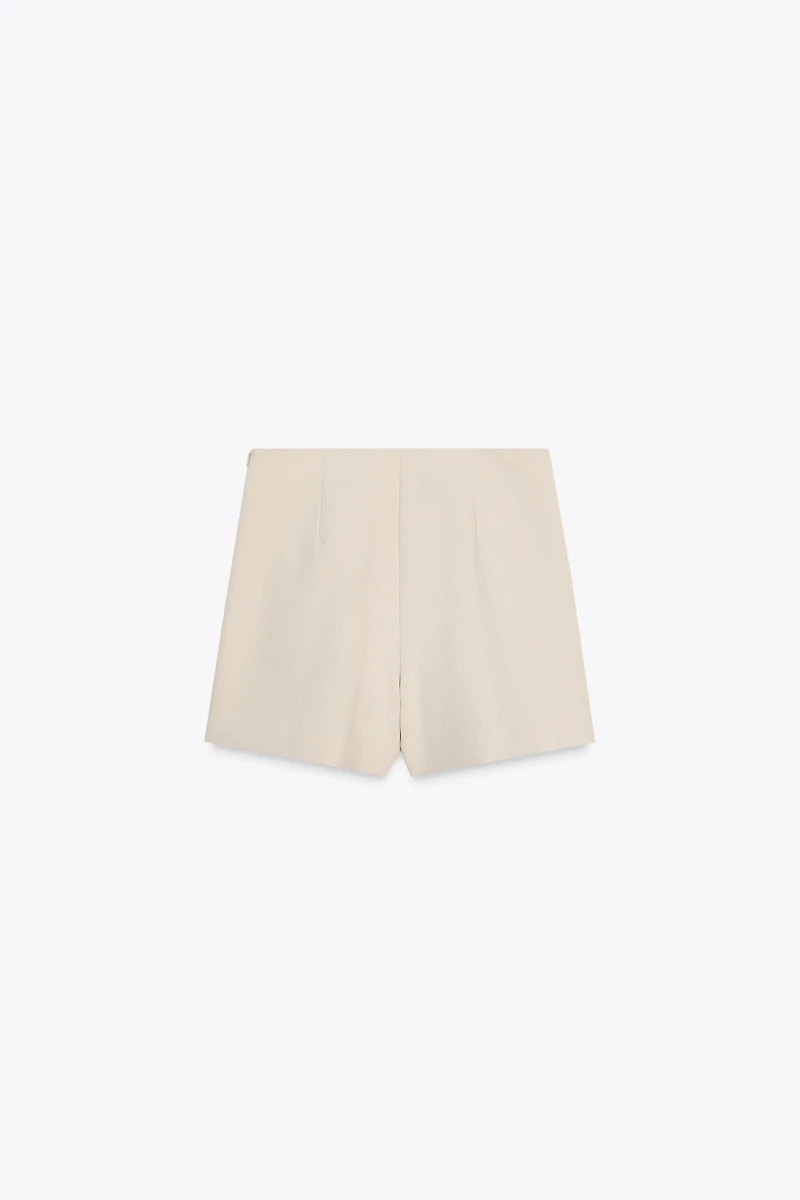 JUPE-PANTALON ASYMÉTRIQUE AVEC APPLIQUE