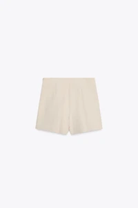 JUPE-PANTALON ASYMÉTRIQUE AVEC APPLIQUE