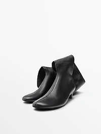 Stretch high-heel boots