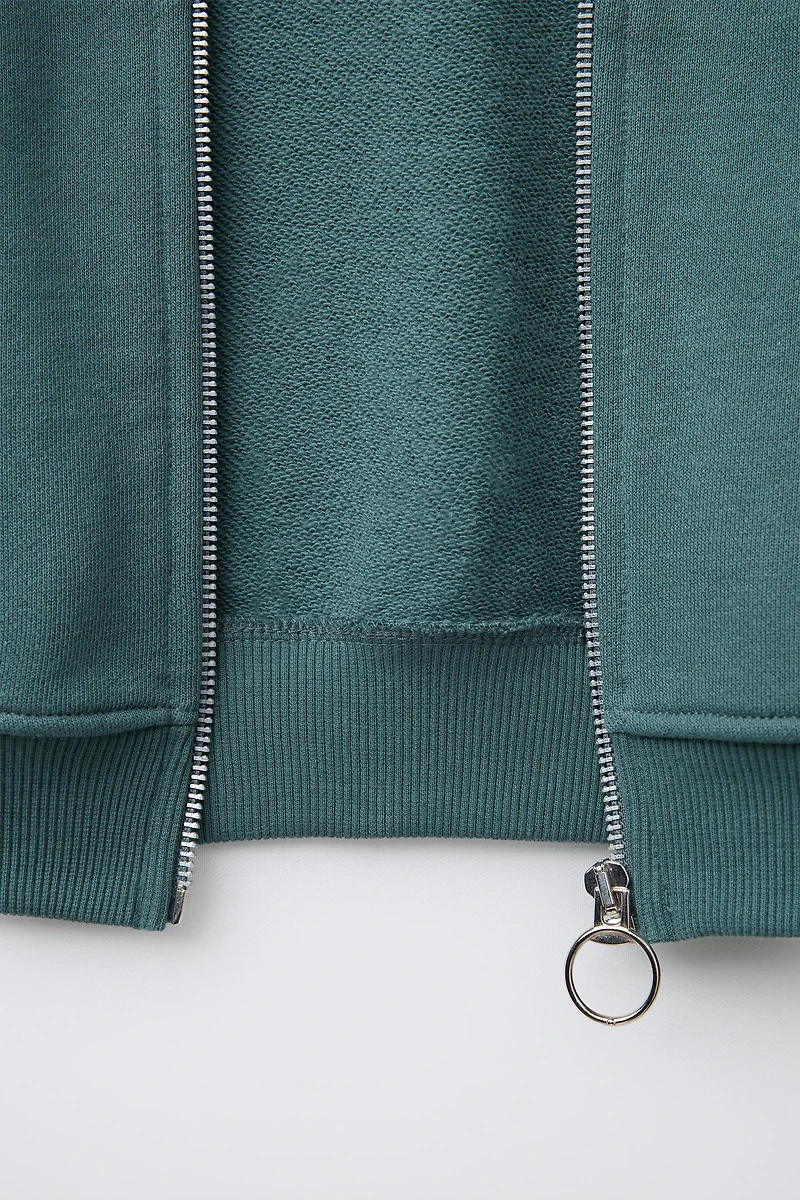 EMBROIDERED ZIP SWEATSHIRT