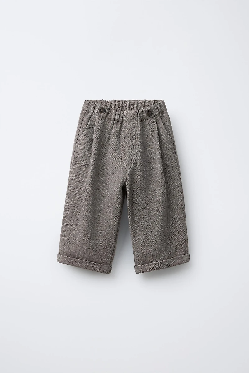 RUSTIC BAGGY PANTS WITH BUTTONS AND WOOL