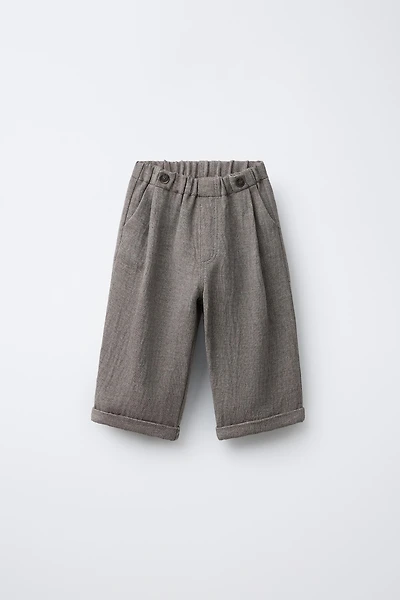 RUSTIC BAGGY PANTS WITH BUTTONS AND WOOL