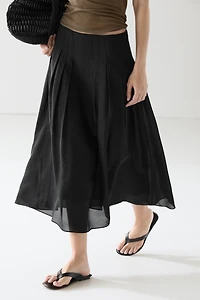 Flowing midi skirt with pintucks