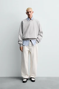 SWEAT RAS DE COU À PIÈCES CHAMPION ® X ZARA