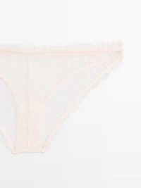 Culotte en dentelle effilochée
