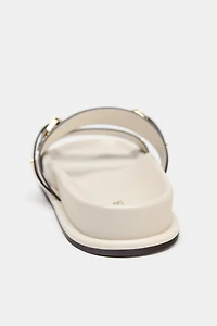FLAT BUCKLED SANDALS