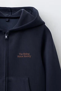 RAISED TEXT HOODED SWEATSHIRT