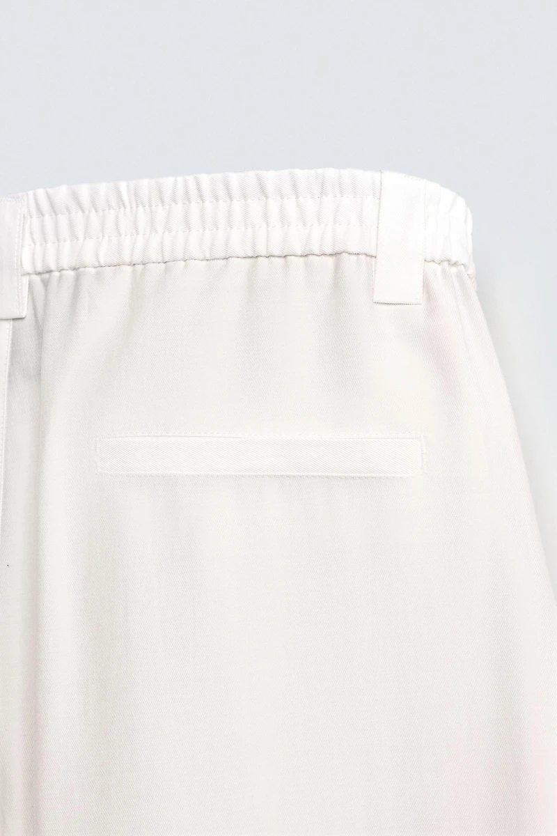 FLOWY PANTS WITH SIDE PLEATS