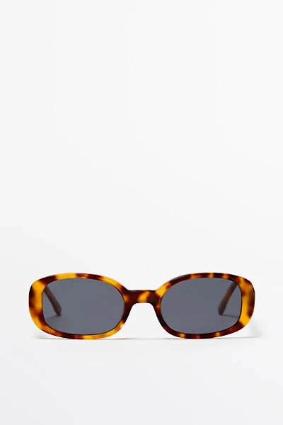 Lunettes de soleil ovales effet écaille