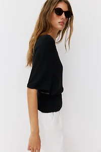 TOP EN MAILLE CEINTURÉ