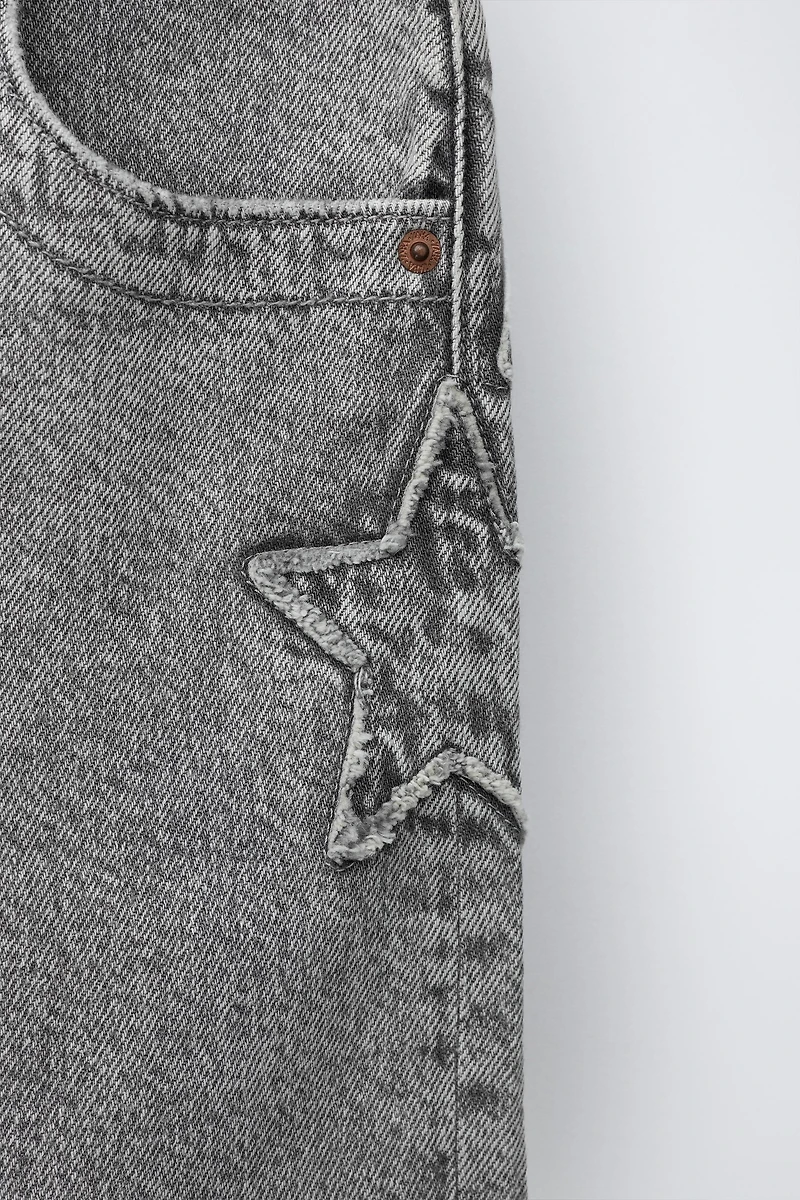 SHORT EN JEAN ÉTOILE ET INSCRIPTION