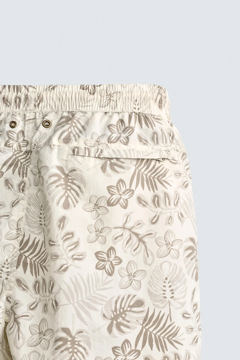 LONG FLORAL PRINT SWIM SHORTS