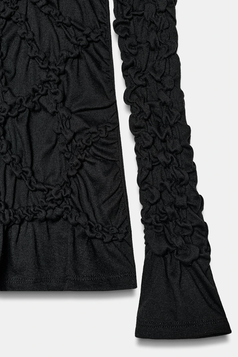 TOP À COL CHEMINÉE ET MANCHES LONGUES