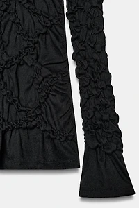 TOP À COL CHEMINÉE ET MANCHES LONGUES