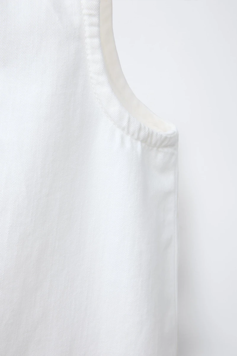 SLEEVELESS ZIP TOP