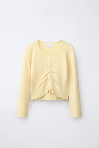 PULL CANNELÉ À PLIS
