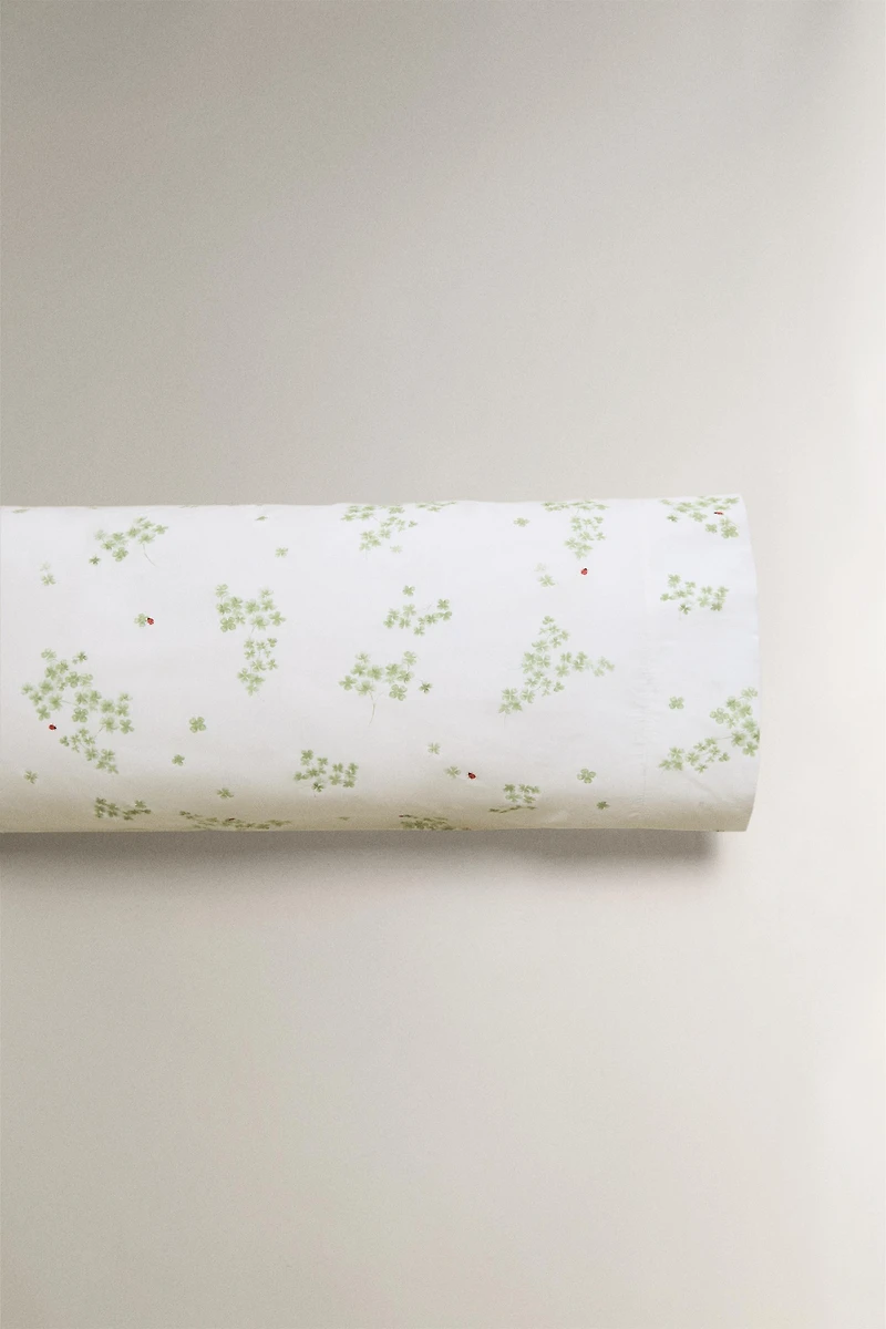 TAIE D'OREILLER PERCALE TRÈFLES ET COCCINELLES